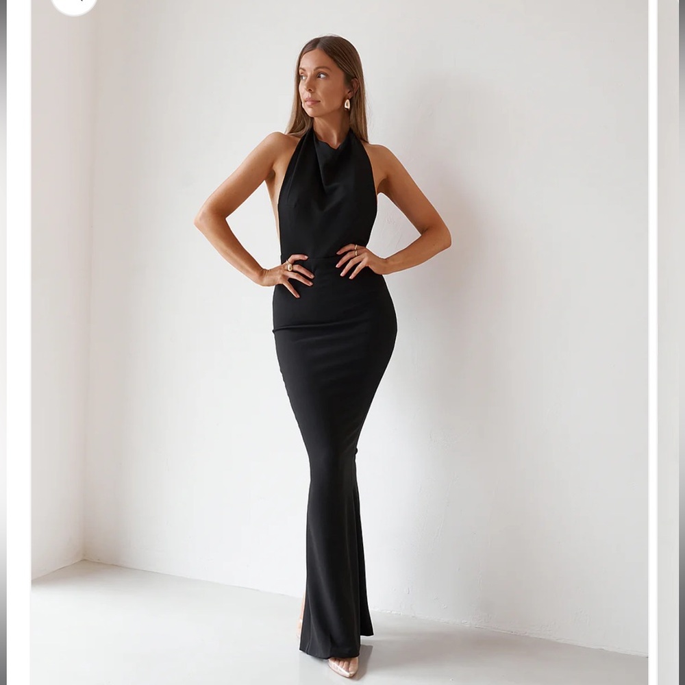 Formal halter backless maxi length dress in black. Good for prom, gala, …